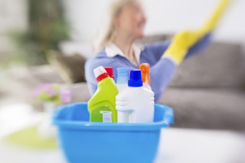 Cleaning staff reviewing safe handling procedures for products