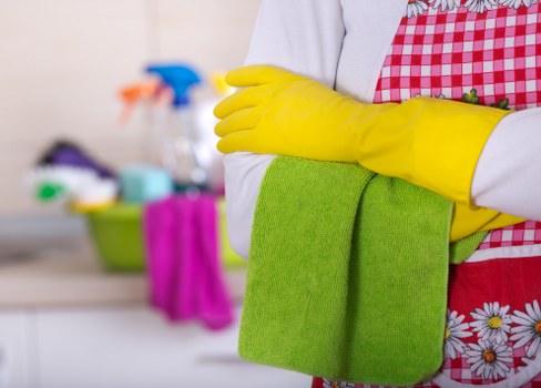 Protective gloves and cleaning supplies used for safer cleaning work
